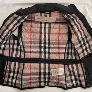 Authentic Women’s Burberry Brit black down puffer vest size Small.